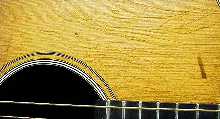 cracks in guitar from humidity problems
