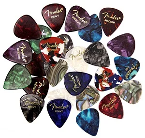 assorted guitar picks thickness