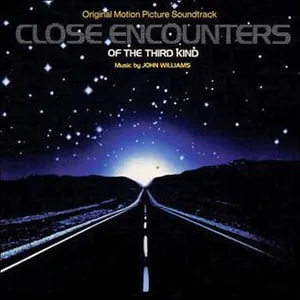 Close Encounters of the Third Kind has a top movie score also by John Williams, the king of scores. It has an incredibly recognizable theme.